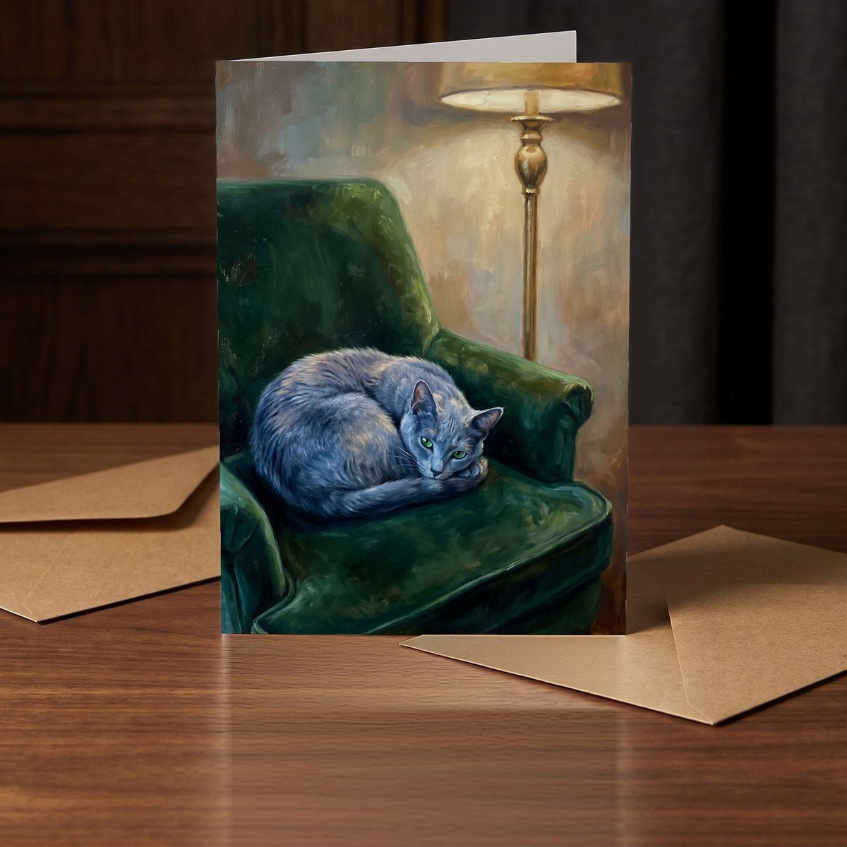 A folded card standing on a warm walnut table in a dim room