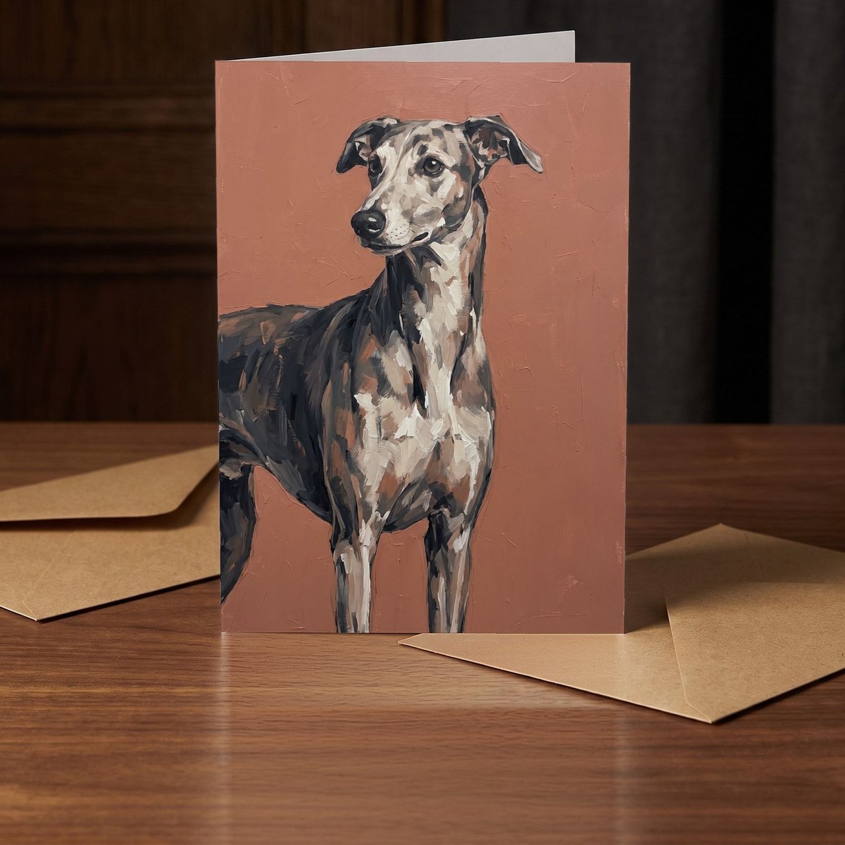A folded card standing on a warm walnut table in a dim room