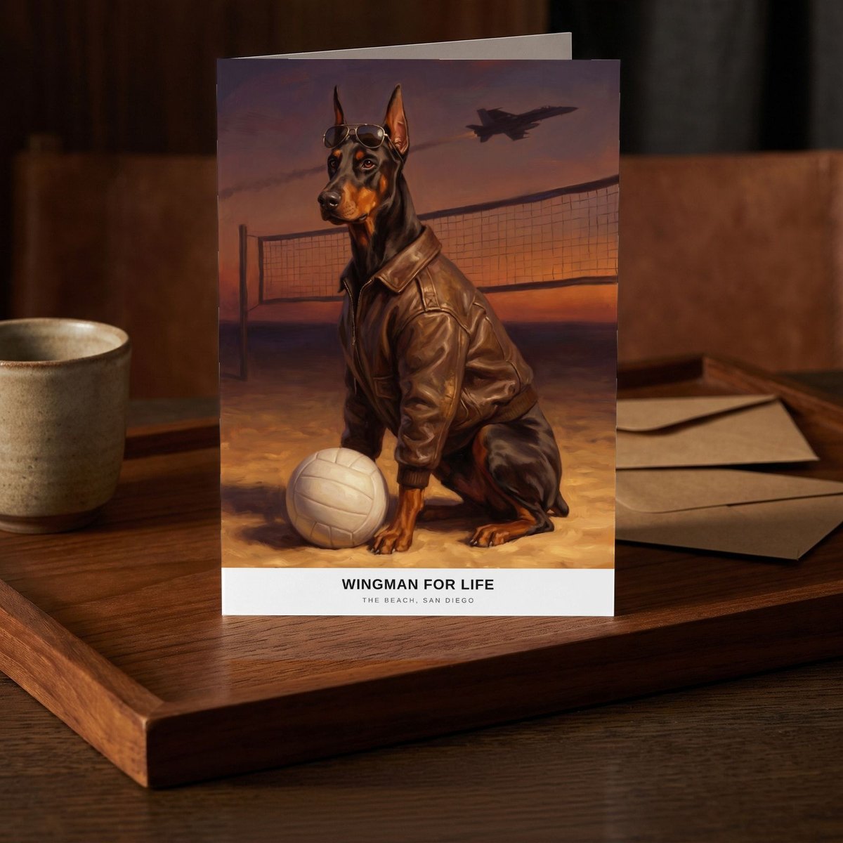 A folded card standing on a dark teak tray beside a small stoneware cup