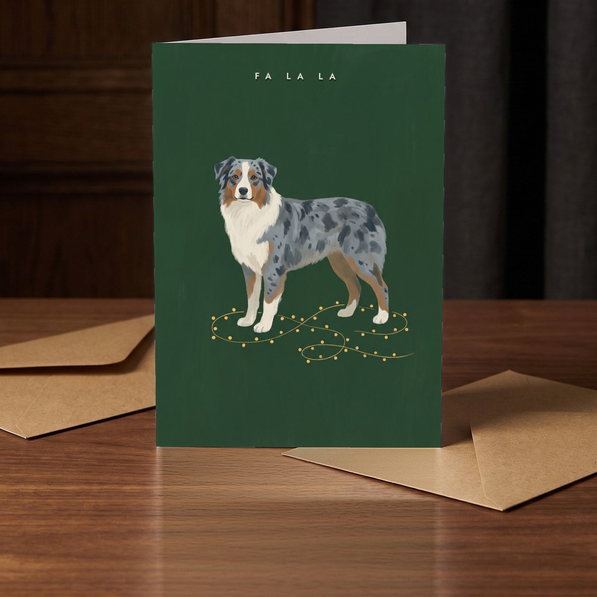 A folded card standing on a warm walnut table in a dim room